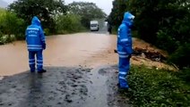 Road swallowed by Hurricane Iota flooding