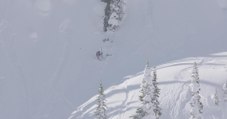 Skier Hits Tree While Skiing Down Mountain and Faceplants to the Snow