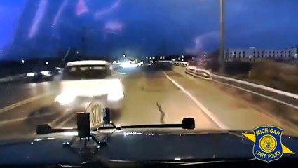 Vehicle loses control on icy road, hits police car