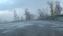 Snow squall drops visibility in western Maryland