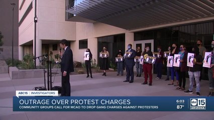 Outrage over gang charges for police protesters in Phoenix
