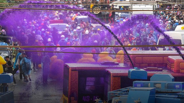 Thai police use water cannons, tear gas on protesters as parliament debates constitution changes