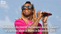 Lil Wayne charged with possessing a firearm and ammunition as a convicted felon
