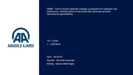 İZMİR - Uyuyakalan fırıncının telefonunun çalındığı anlar, güvenlik kamerasına yansıdı