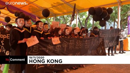 Hong Kong students chant pro-democracy slogans in rare act of defiance