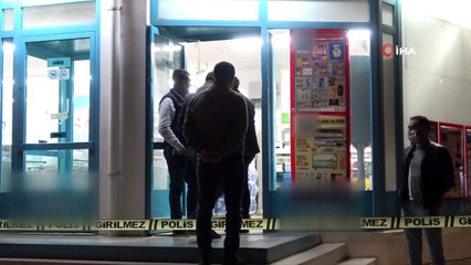 Kar maskeli bir kişi pompalı tüfekle market soydu