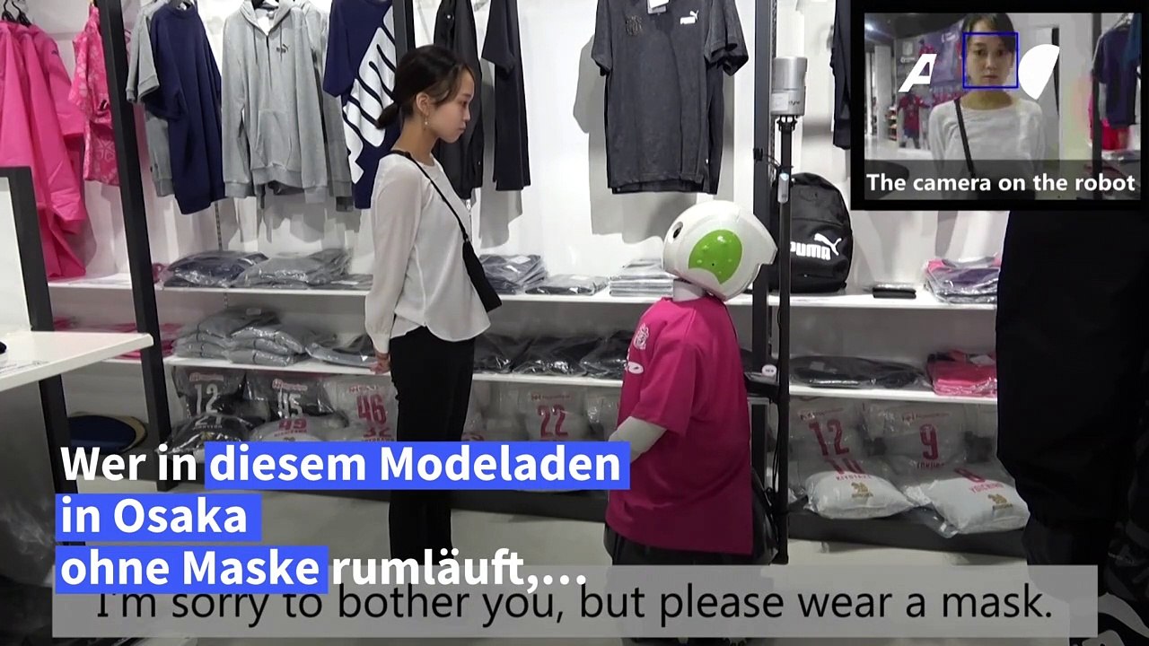 Roboter fordert zum Maskentragen auf