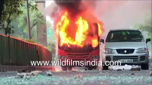 Public transport buses, motorcycles in flames and smoke near JMI after CAA rally