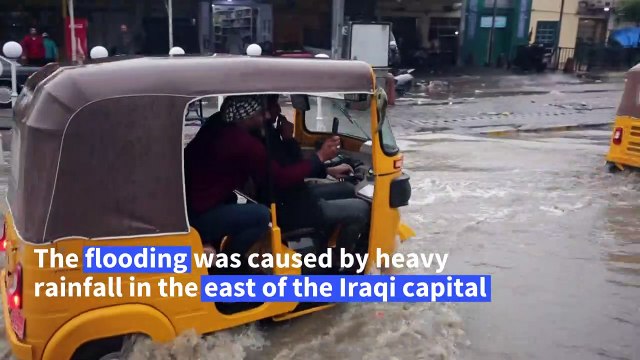 Heavy rain floods the streets of Iraqi capital Baghdad