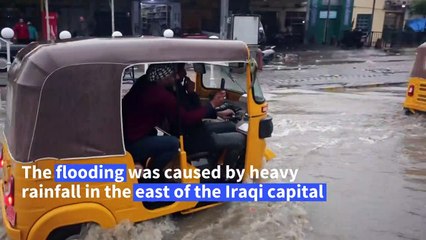 Heavy rain floods the streets of Iraqi capital Baghdad