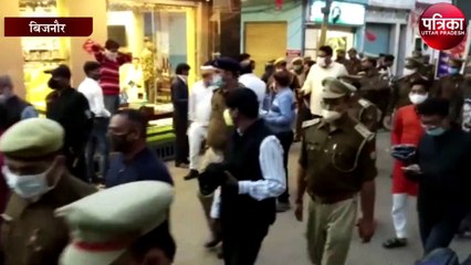 कोविड-19 को लेकर बाजार में पुलिस का फ्लैग मार्च