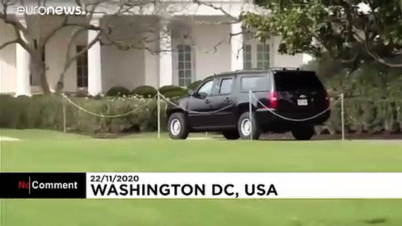 Donald Trump cheered by supporters as he heads to golf course