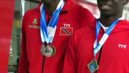 Swimmers Return Home