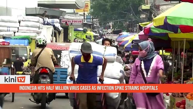 Indonesia hits half million virus cases as infection spike strains hospitals