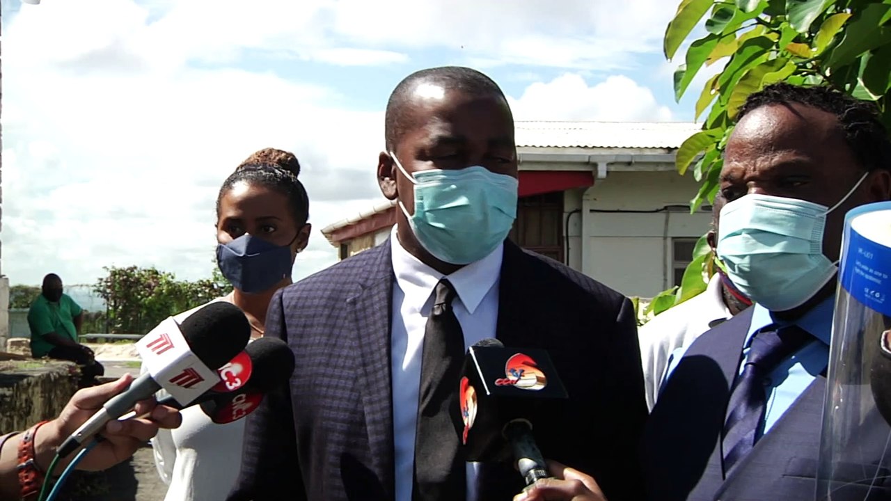 Officials Visit Decapitated Statue