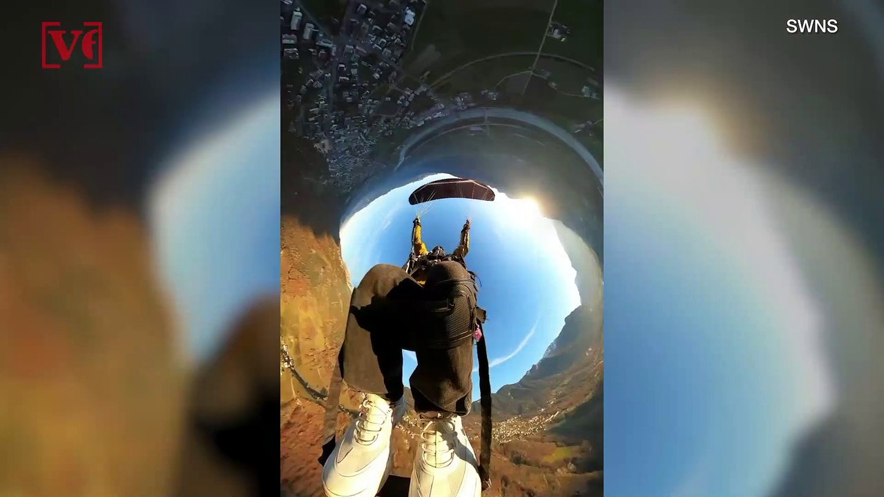 Dizzying Heights! Paragliding Acrobat Spins 360 Degrees in Video That Might Make You Woozy!