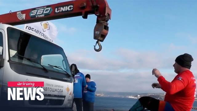 Men vs machines: Russian athletes show off their strength