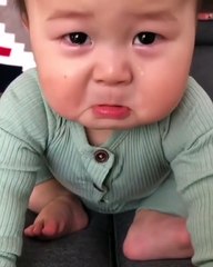Cute Baby weeping with fluffy cheeks