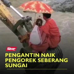 Pengantin naik pengorek seberang sungai