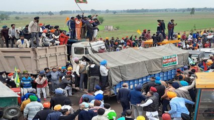 Video:Farmers got aggressive, pushed the road blocker truck!