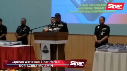 Wanita ditahan pasang Jalur Gemilang terbalik