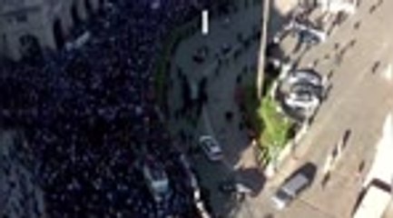 Crowds follow Maradona's funeral procession through Buenos Aires