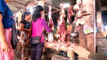 Women shop for prime cuts at meat market in Mizoram