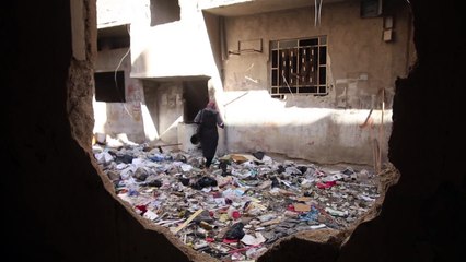 نازحون من مخيم اليرموك في دمشق يأملون بعودة قريبة إلى منازلهم