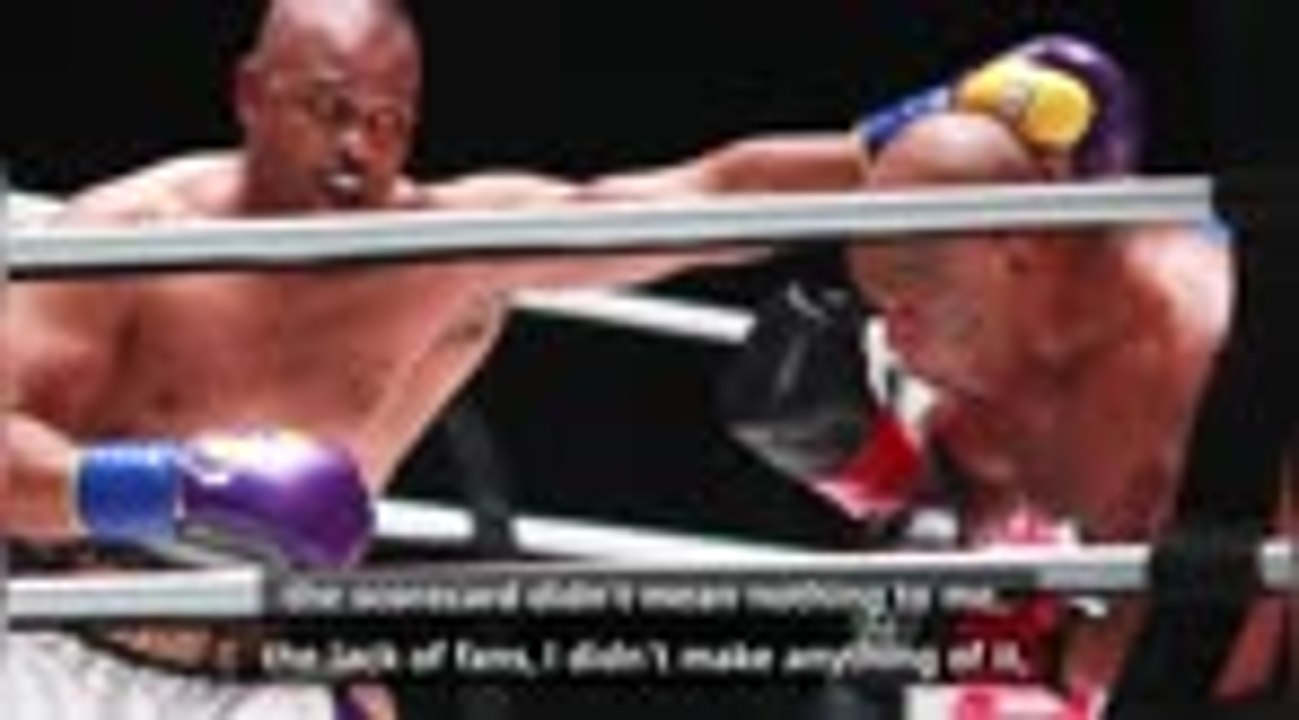 Tyson hints he'll be back after draw with Jones Jr