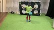 Blindfolded Boy Juggles Soccer Ball With Feet While Jumping Rope