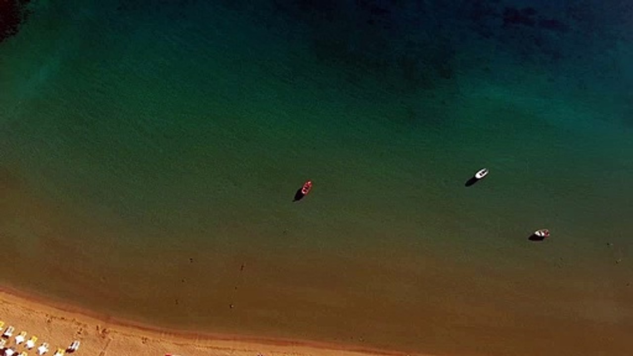 Small boats in the ocean Nature beautiful scene royalty Free  Stock no copyright background  video, creative common Free for commercial use, dron aerial view 4K- or full HD, in the world