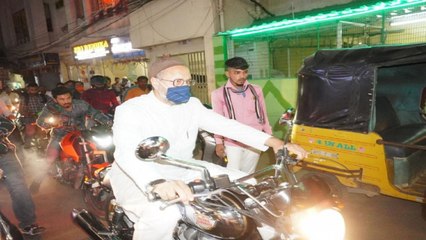 Owaisi rides bullet to polling center to casts his vote