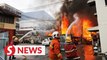 Road closed for rescuers battling house fire in Penang