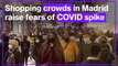 Festive lights and Christmas shopping bring crowds to central Madrid, despite pandemic