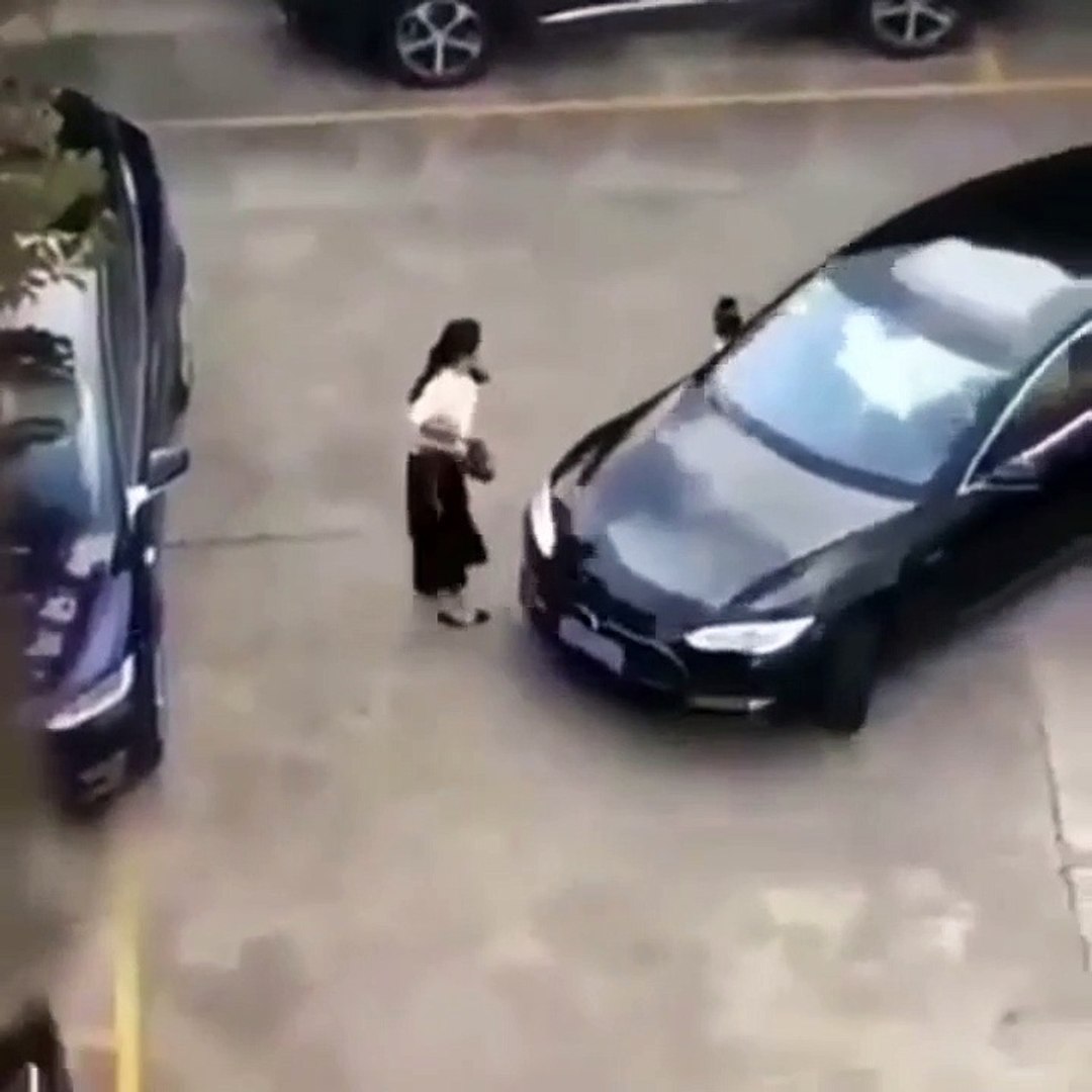 ⁣Girl crashes car tesla