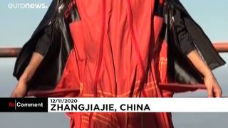 Asia's top wingsuit athlete jumps into the void from Tianmen Mountain