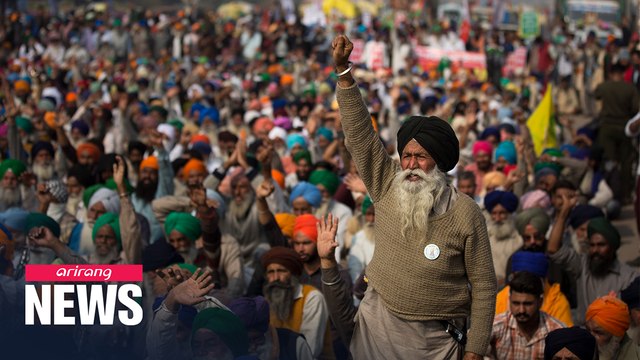 Tens of thousands of farmers swarm India's capital to protest deregulation rules