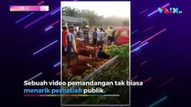 Cuman di Indonesia, Kuburan Samping Lapangan Bola
