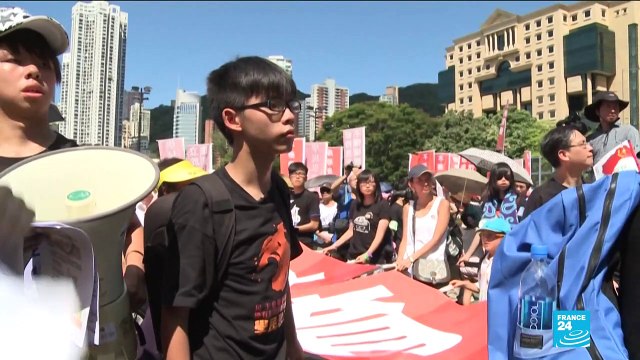 Leading Hong Kong activists sentenced to jail over pro-democracy protests