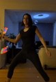 Woman Plays With Nunchucks Displaying Images In Air