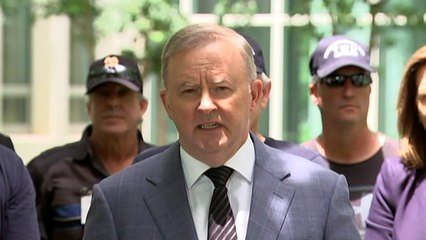Albanese condemns Qantas job cuts