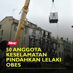 50 anggota keselamatan pindahkan lelaki obes