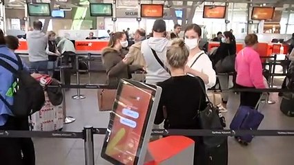 Two international arrivals board domestic flight without quarantining