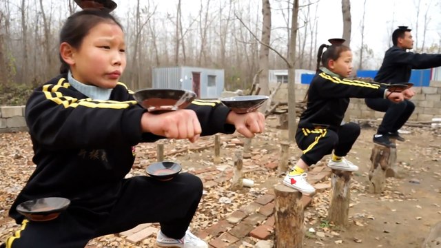 Kids master kung fu after dad trains them to become local martial arts champions in China