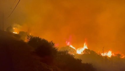 Bond Fire burns overnight in California