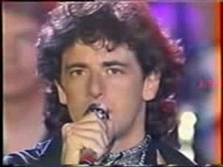 Patrick Bruel et Johnny Hallyday chantent "Casser la voix" en live