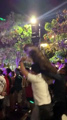 Happy Husky Hoisted onto Shoulders During Gathering