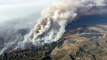 Bond wildfire explodes in size forcing evacuations in southern California