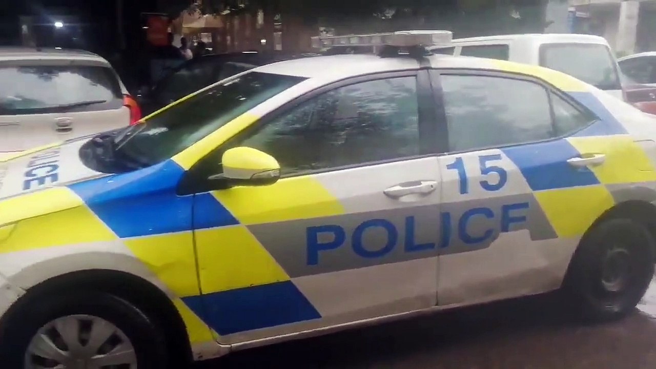 Police Cops  Blocks Parked Cars at Parking