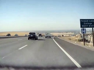 Unsecured Ladder Bounces Along Freeway